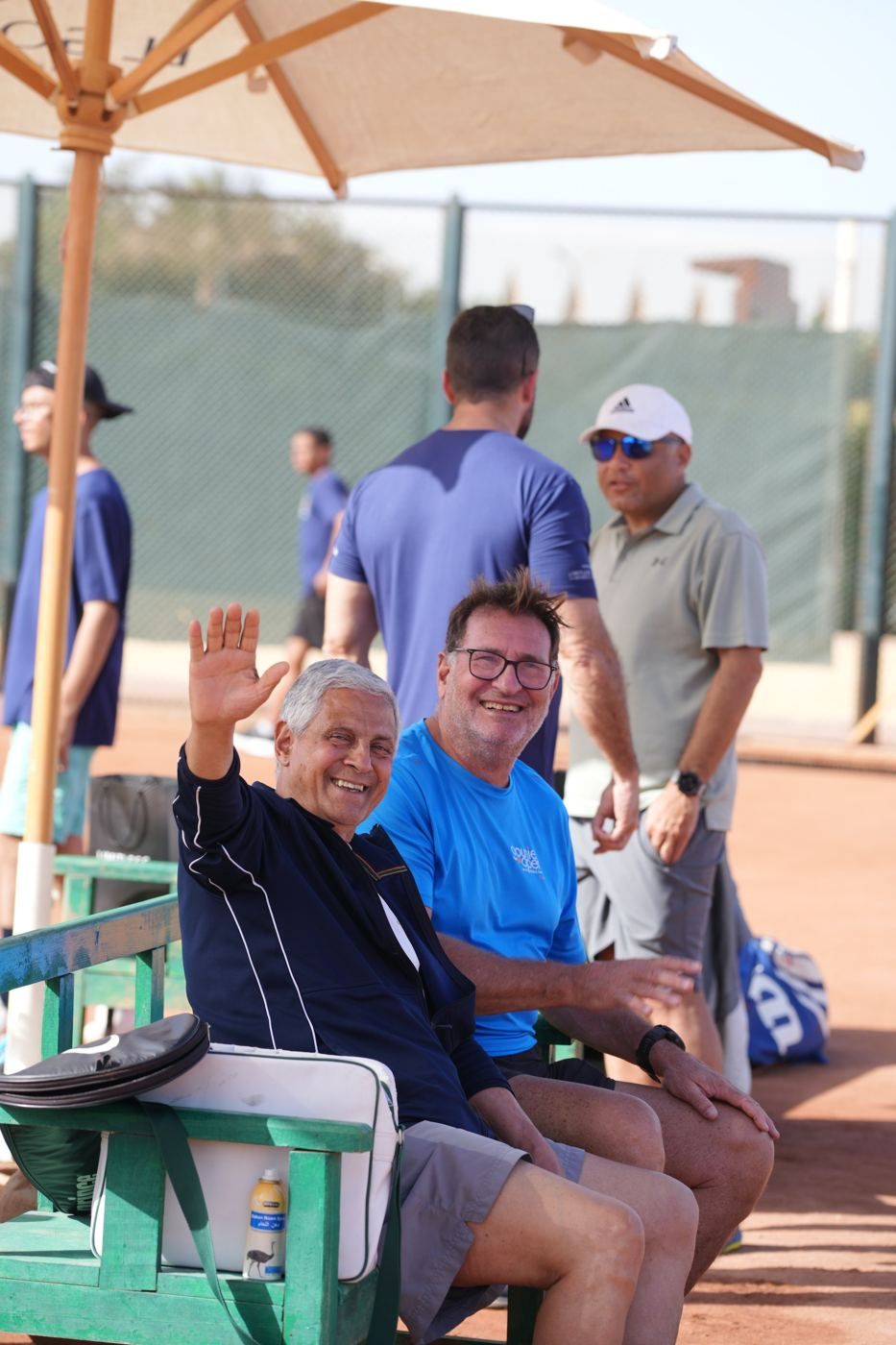 Players waving from the bench