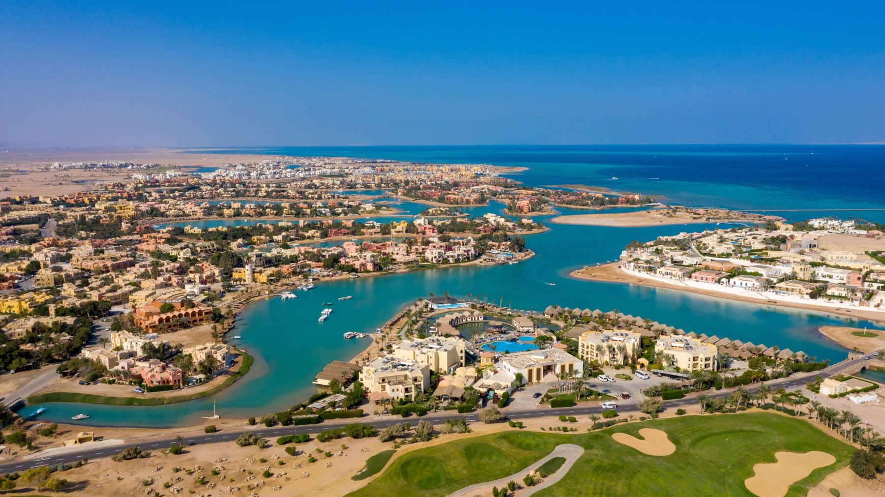 Aerial view of El Gouna's turquoise lagoons, hotels and the Red Sea