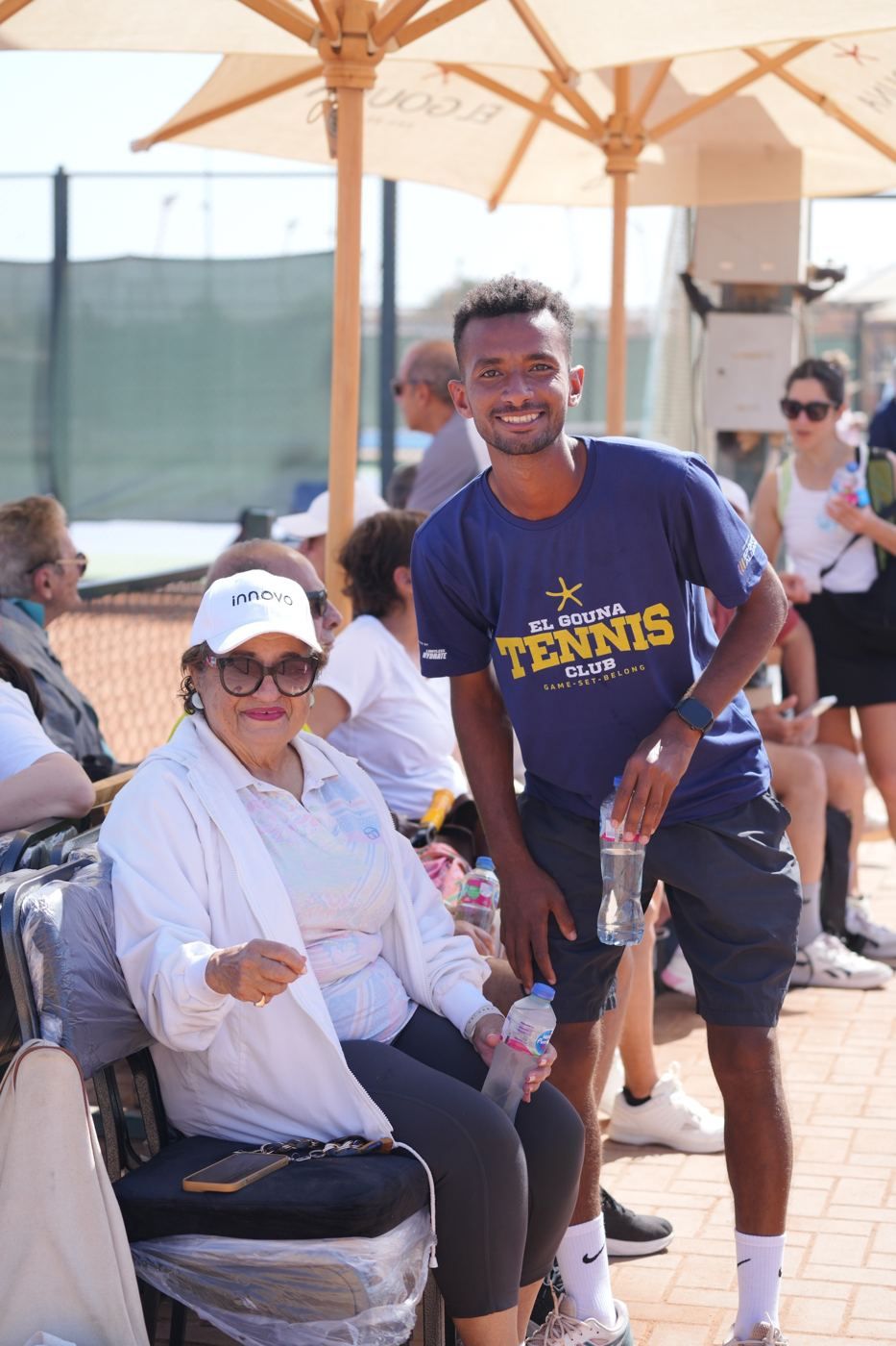 A spectator with a club coach